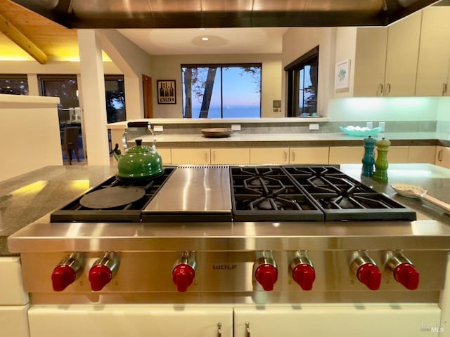 kitchen featuring white cabinets