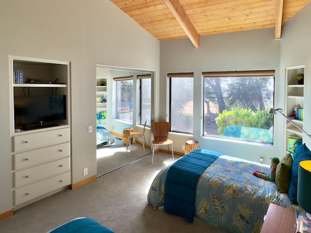 carpeted bedroom with vaulted ceiling with beams and wood ceiling