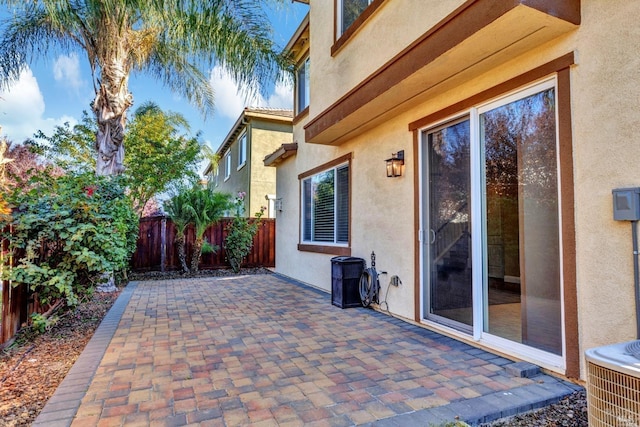 view of patio featuring a fenced backyard and central AC unit