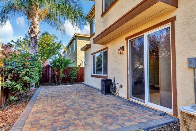 view of patio featuring a fenced backyard and central AC unit