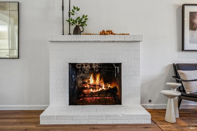 details with a fireplace and hardwood / wood-style floors