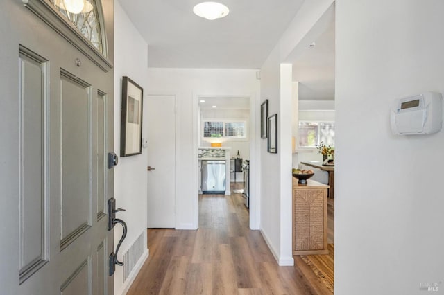 hallway featuring hardwood / wood-style floors