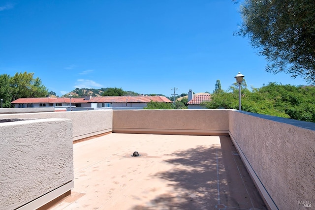 view of patio with a balcony