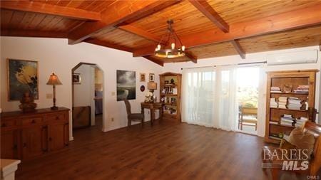 misc room featuring wood ceiling, lofted ceiling with beams, an AC wall unit, dark wood-type flooring, and a notable chandelier