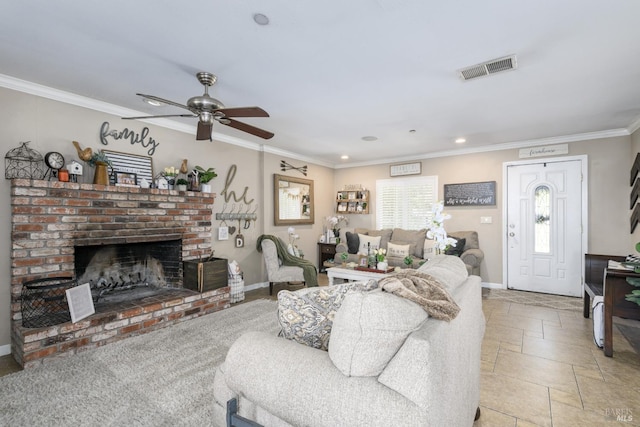 living room featuring ceiling fan, ornamental molding, and a fireplace