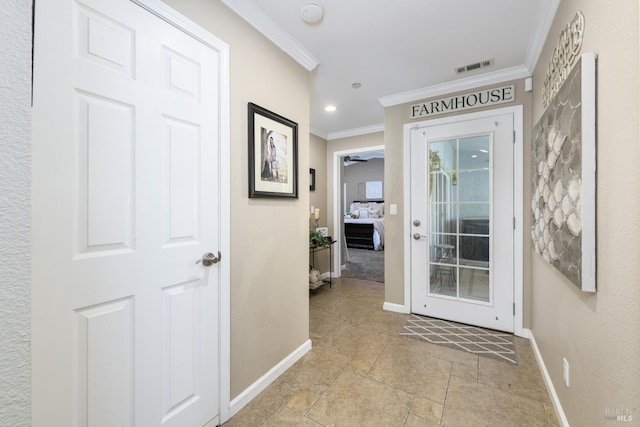 doorway to outside with ceiling fan and crown molding