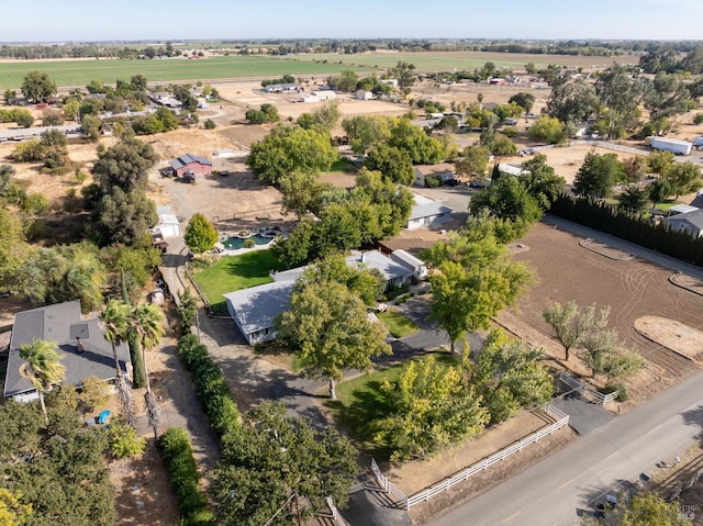 birds eye view of property featuring a rural view