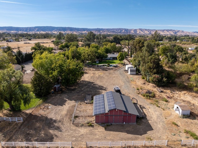 bird's eye view featuring a mountain view and a rural view