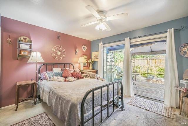 bedroom with ceiling fan, light carpet, and access to exterior