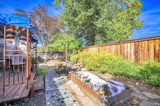 view of yard featuring a deck