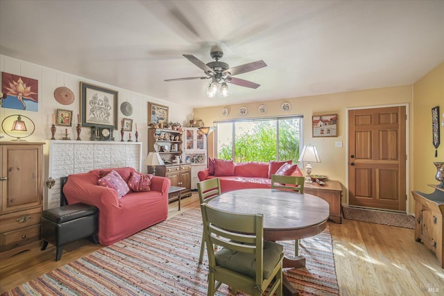 interior space with light hardwood / wood-style flooring and ceiling fan