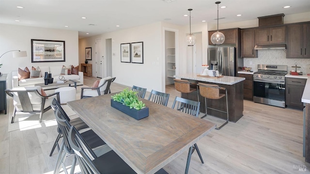 dining room featuring light hardwood / wood-style floors