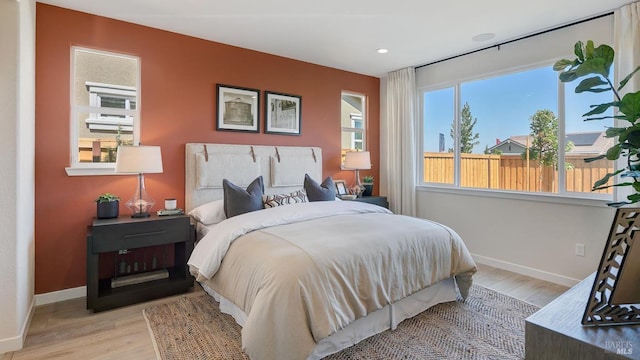 bedroom featuring light wood-type flooring