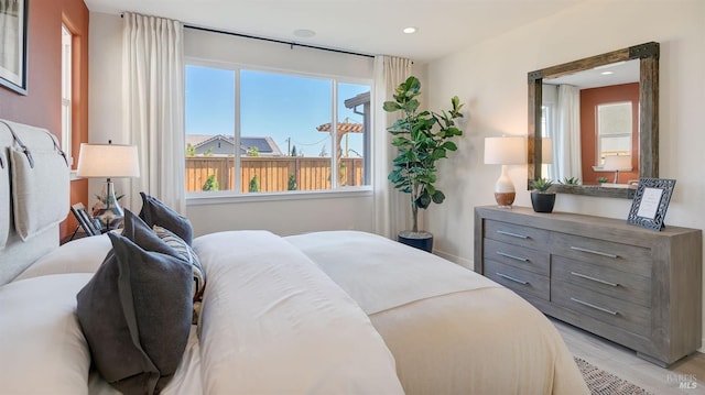 bedroom featuring light wood-type flooring