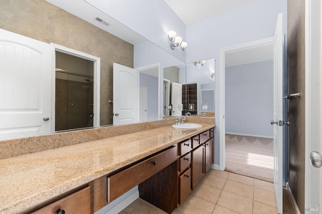 full bathroom with walk in shower, vanity, tile patterned floors, baseboards, and visible vents