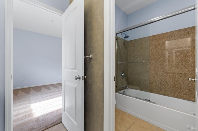 bathroom with shower / washtub combination and tile patterned floors