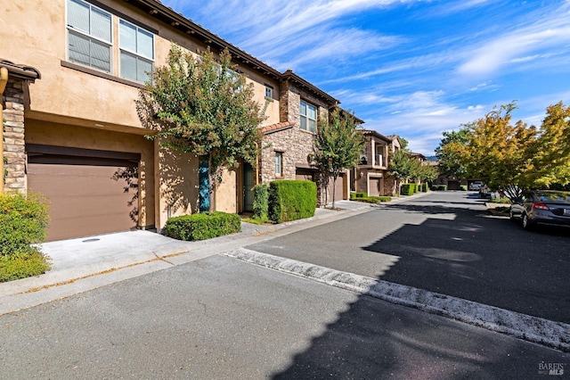 view of street featuring a residential view