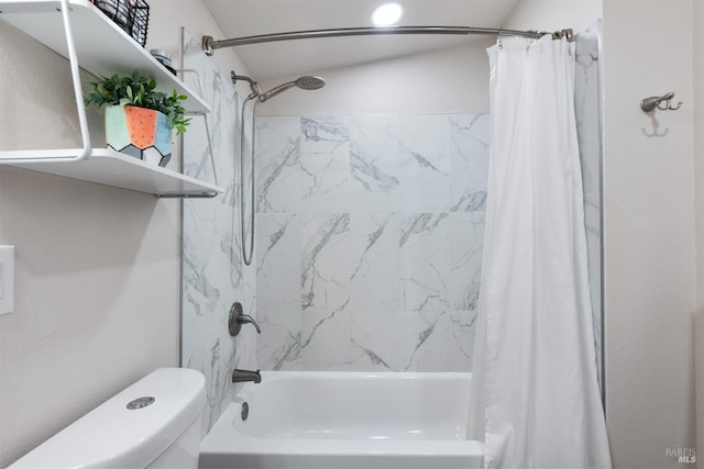 full bathroom featuring shower / bath combo and toilet