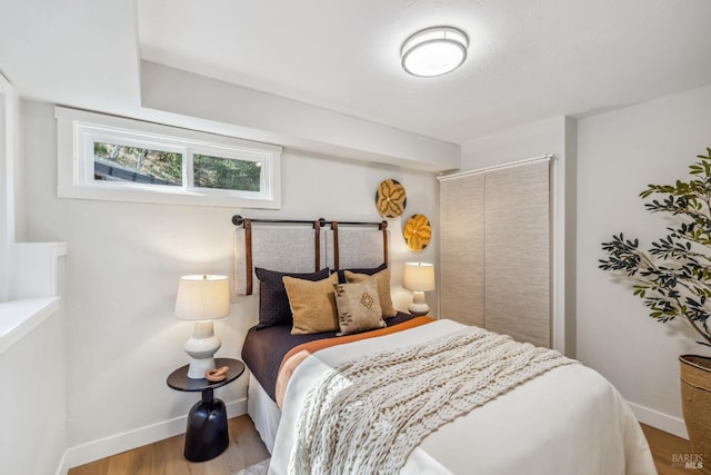 bedroom featuring wood-type flooring