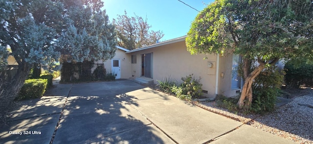 view of home's exterior featuring a patio