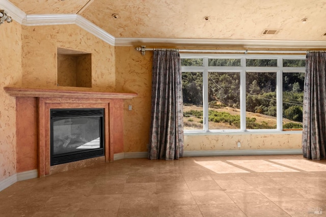 unfurnished living room featuring crown molding and vaulted ceiling