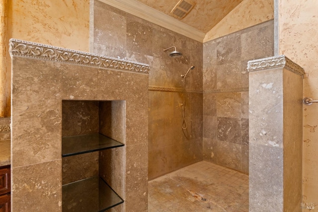 bathroom featuring a tile shower