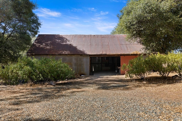 exterior space with an outbuilding