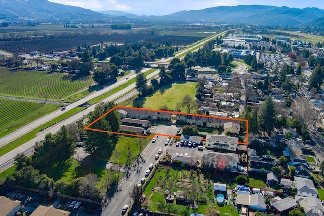 bird's eye view with a mountain view