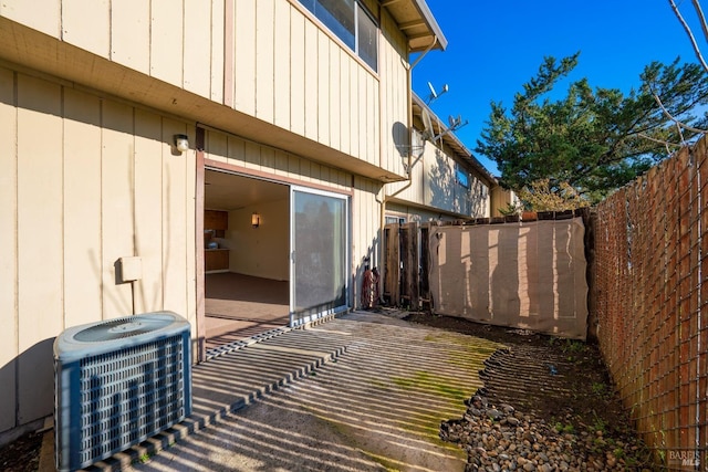 view of patio / terrace with central AC unit