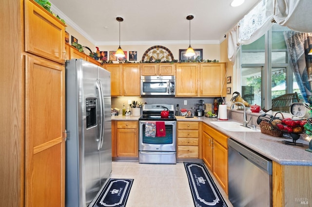 kitchen featuring sink, crown molding, decorative light fixtures, light tile patterned flooring, and stainless steel appliances