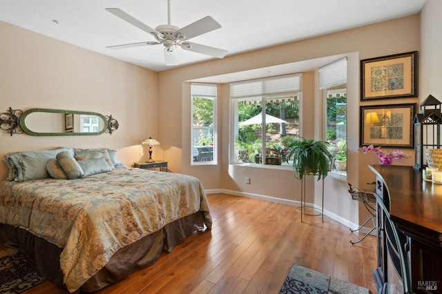 bedroom featuring ceiling fan and light wood-type flooring