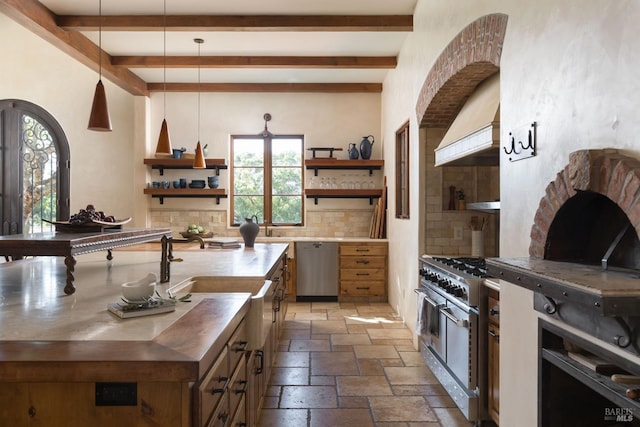 kitchen featuring stone tile floors, appliances with stainless steel finishes, decorative backsplash, open shelves, and beamed ceiling