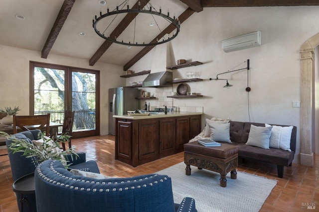 interior space with high vaulted ceiling, french doors, a wall mounted air conditioner, and beamed ceiling