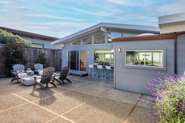 view of patio featuring fence