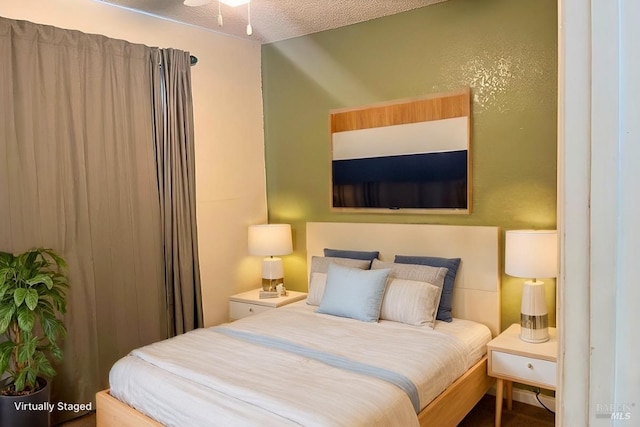 bedroom featuring a textured ceiling