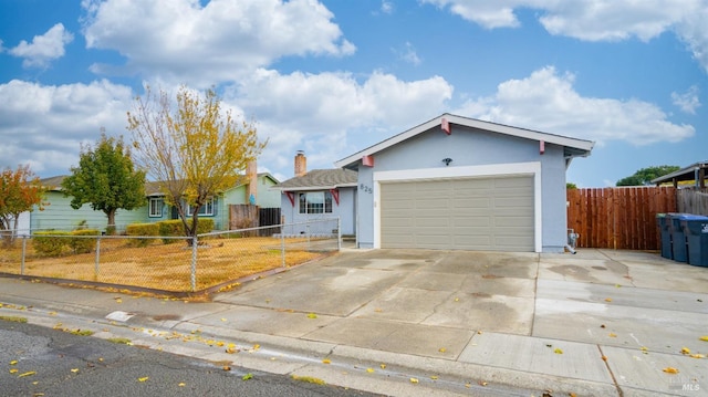 ranch-style home with a garage