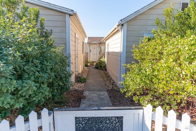 view of property exterior with fence