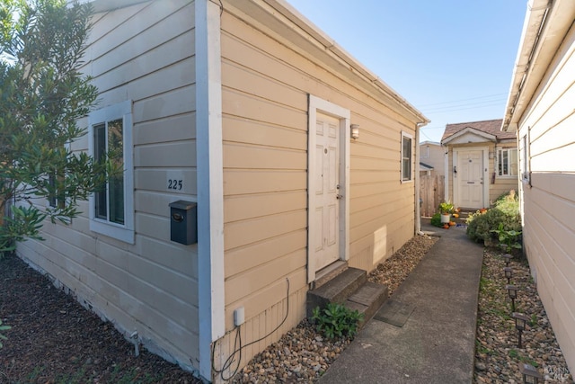 view of property exterior with entry steps