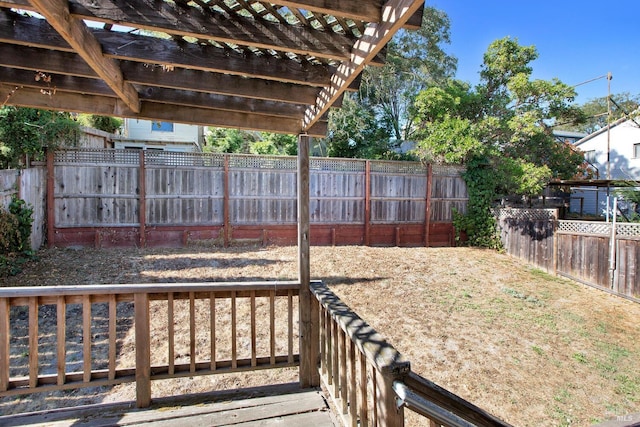 view of yard featuring a fenced backyard and a pergola