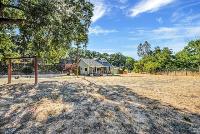 view of front of house featuring a playground