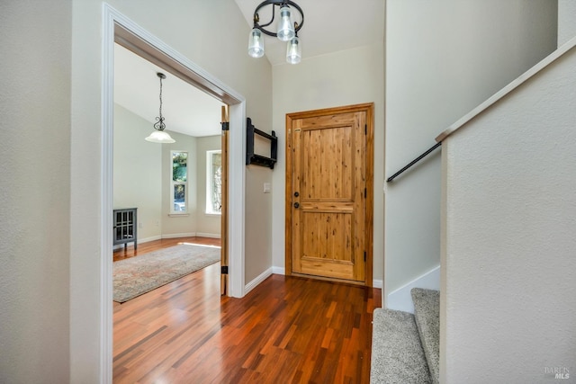 foyer entrance with dark wood-type flooring