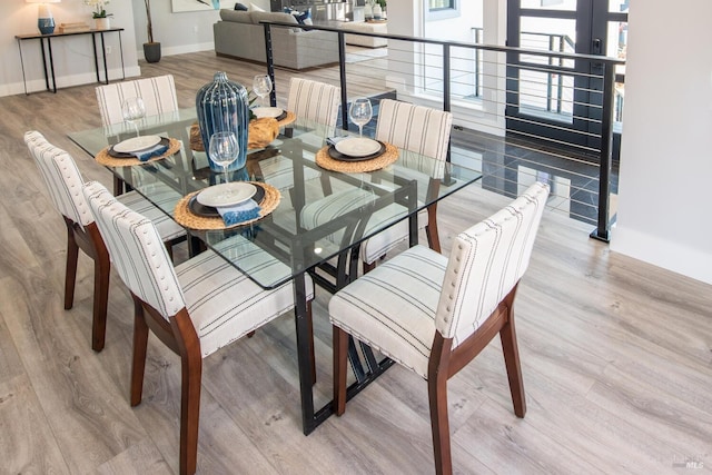 dining area featuring light hardwood / wood-style flooring