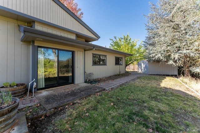 view of property exterior with a lawn