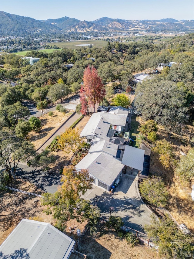 drone / aerial view featuring a mountain view