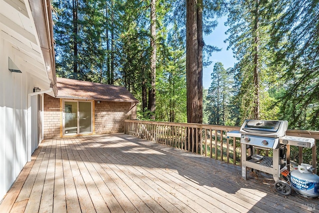 wooden deck with grilling area