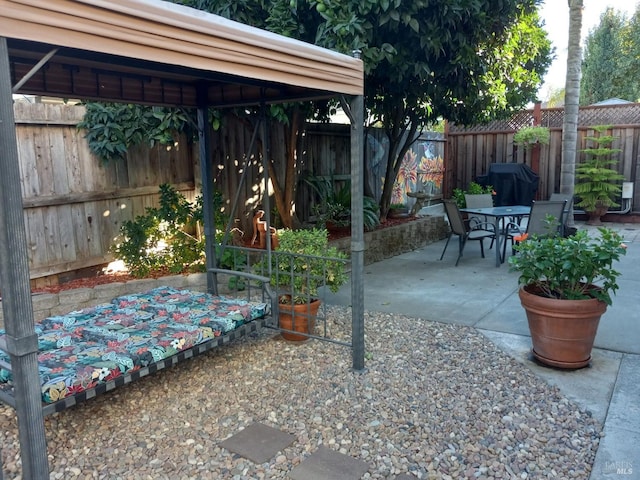 view of patio featuring a gazebo and grilling area