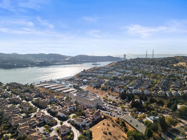 aerial view featuring a water and mountain view