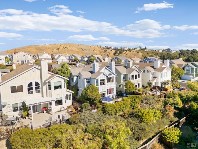 birds eye view of property with a residential view