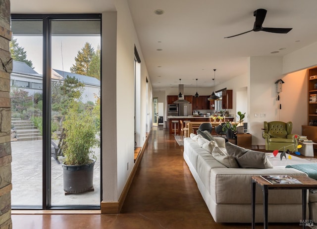 living room featuring ceiling fan