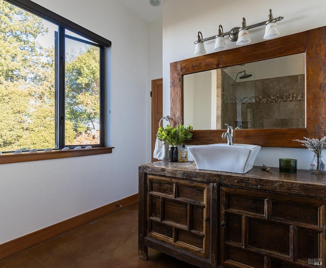 bathroom with vanity and walk in shower